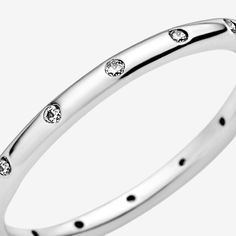 Add a subtle touch of sparkle to every outfit with our sterling silver ring, hand-finished and polished to a high shine. The classic eternity ring is perfect for any occasion and the cubic zirconia put the sparkle in your style. Simple yet stylish, it looks elegant worn alone or stacked with other Pandora rings in contrasting metal tones. - Pandora Simple Sparkling Band Ring - Sterling silver / Cubic Zirconia / Clear - Sz. 5 Classic Sterling Silver Promise Ring Eternity Band, Classic Sparkling Rings For Promise, Classic Sparkling Promise Ring, Classic Rings With Sparkling Stones For Gift, Classic Sterling Silver Rings With Sparkling Stones, Classic Promise Ring With Sparkling Stones, Classic Sterling Silver Stackable Eternity Band, Classic Sterling Silver Eternity Band In Silver, Classic Cubic Zirconia Rings With Sparkling Stones