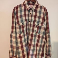 New With Tags, A Classic To Add To Any Closet, From The Original American Heritage Brand Filson. They've Taken Their Amazing Alaskan Guide Shirt And Made It With A Soft And Worn In "Vintage Wash" Flannel. Size Xl Pit To Pit 26" I’ve Done The Best Of My Ability To Accurately Photograph And Measure This Item. Please Reach Out With Questions Before Ordering If You Are Unsure. I Try To Ship All Orders Within Two Days. Comes From Household With Pets. Filson Does Tend To Run Larger And Roomier Than Mo Plaid Cotton Shirt With Pockets, Cotton Top With Spread Collar For Fall, Plaid Spread Collar Top With Pockets, Plaid Long Sleeve Relaxed Fit Tops, Plaid Top With Pockets And Spread Collar, Plaid Long Sleeve Tops With Relaxed Fit, Plaid Cotton Top With Spread Collar, Purple Cotton Shirt With Pockets, Purple Collared Tops With Pockets