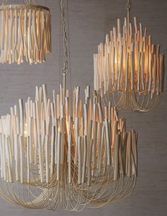 a chandelier made out of wood sticks