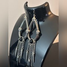 Boho Chic Style, Silver Toned And Black Dangling Earrings Edgy Pierced Earrings For Party, Black Sterling Silver Edgy Earrings, Bohemian Metal Earrings For Evening, Black Edgy Sterling Silver Earrings, Edgy Black Sterling Silver Earrings, Edgy Silver Drop Earrings, Edgy Silver Dangle Jewelry, Black Punk Metal Earrings, Edgy Drop Earrings For Party