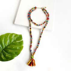 Two connected strands of colorful textile wrapped beads is punctuated with a tassel. Different Necklines, Layered Style, Kantha Fabric, Layer Style, Running Stitch, Women Artisans, Kantha Quilt, Brass Metal, Metallic Accents