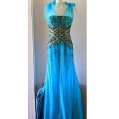 This Is A One Of A Kind Piece That Was Custom-Made And Hand-Made With Intricate Beading And A Gorgeous 1920's-1940's Style. Light Sky Blue With Bronze, Gold And Baby Blue Beading And Crystals. Taffeta Adjustable Tie-Shoulders That Attach Under The Bust To Give A Gorgeous Ruched Bust/Neckline. This Gown Is So Freaking Unique And Beautiful! Size 8, Please See Approximate Lay-Flat Measurements For Pit To Pit, Waist And Total Length. Skirt Of Dress Has Three Layers: Interior Layer Is An Opaque Polyester Blend, Middle Layer Is A Silky Feel Sheer, And The Top Layer Is An Open Layer Of The Same Material That Is Fully Lined With Beading And Has Sporadic Beading Throughout. The Bodice Is Boned Fo 1940's Style, Intricate Beading, Light Sky Blue, Bronze Gold, 1940s Fashion, Art Deco Style, Deco Style, Ball Gown, Art Deco Fashion