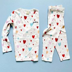 It must be love: our beloved organic cotton basics that you trust for baby are now available in a toddler heart pajamas set too! Your big kid will adore the soft feel, comfy fit and beautiful heart print with "Je t'aime" embroidery. Cozy and beautiful, these pjs will surely bring sweetest dreams! Wonderful for baby and big sibling matching. Made in India from 100% organic cotton Machine wash and dry on gentle for best results Elastic waist for comfy fit and easy on and offs Heart Pajamas, Newborn Baby Gift Set, Trendy Baby Gifts, Sweetest Dreams, Airplane Baby, Newborn Toys, Be Love, Knitted Romper, Stylish Baby