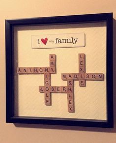 a framed crossword puzzle with the words i love my family