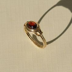 Ancient Heirloom Ring - Garnet – COMMON ERA Ancient Rings, Common Era, Heirloom Ring, Heirloom Rings, Solid Gold Band, Free Gems, Medallion Necklace, Ethical Jewelry, Gold Piece