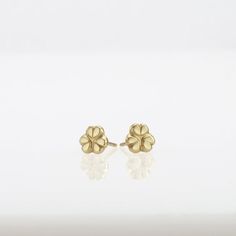 Shiny stud gold flower earrings, handmade of yellow solid 14k gold.These small dainty earrings are perfect for every day’s wear. They are small but well noticeable.Smooth and shiny, and comfortable to wear.These beautiful classy earrings can be a great gift as they can be enjoyed at any age and outfit.14k solid gold ear backs are included.Flower’s diameter is approx 6 mm =  ~0.24 inch each* The earrings will be packed in a gift box ready to give as a gift *To see more gold earrings click here: h Yellow Gold Flower Earrings In 14k, 14k Gold Flower Earrings For Gift, Delicate 14k Gold Flower Earrings, 14k Yellow Gold Flower Earrings For Anniversary, Dainty Yellow Gold Cluster Earrings, Wedding Flower Earrings In 14k Yellow Gold, Gold Flower Charm Earrings In 14k Gold, Gold Flower Earrings With Flower Charm, 14k Gold Flower Earrings For Pierced Ears