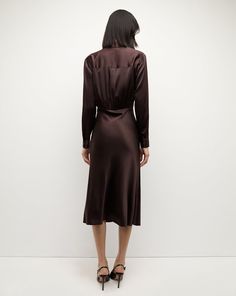 With a wrap-style top and a bias-cut skirt, the Otis is a chic wardrobe hero that takes the guesswork out of getting dressed. Cut from fluid stretch silk, this effortless dress is great for work and can easily be dressed up for night. 53% Silk, 35% Viscose, 12% ElastaneUnlinedDry clean onlyStyle #2409FL5021197 Fitted Viscose Silk Dress With V-neck, Fitted V-neck Silk Viscose Dress, Fitted V-neck Silk Dress, Sleek Long Sleeve Silk Midi Dress, Elegant Silk Wrap Dress For Date Night, Semi-formal Fitted Viscose Midi Dress, Fitted Viscose Midi Dress For Semi-formal Occasions, Viscose Midi Dress With Bias Cut For Daywear, Satin Long Sleeve Silk Dress For Work