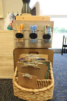 a wicker basket holding files and folders on top of a carpeted floor