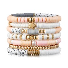 PRICES MAY VARY. Pink Stackable Bracelets: This surfer heishi clay bead bracelets set includes 7 unique bracelets, featuring 6 distinct compositions of gold-plated beads, polymer clay beads in shades of pink, gray, and white. And an additional bracelet composed of gold-plated round beads. With a dominant pink hue, these bracelets add a pop of color and style to your everyday ensemble. Great Material: Our friendship bracelets are crafted with care, strung by hand with pearl beads, 14K gold-plated Mommy And Me Clay Bead Bracelets, White And Gold Clay Bead Bracelet, Christmas Clay Bracelets, Clay Bead Brackets, Bracelet Beads Ideas, Cute Beaded Bracelets, Flat Bead Bracelet, Polymer Clay Bead Bracelet, Clay Bead Earrings