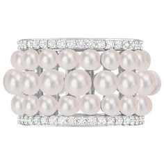 This exquisite piece showcases a sterling silver band adorned with an array of beautiful white button-shaped freshwater cultured pearls and sparkling lab-created white sapphires. Immerse yourself in the timeless elegance and sophistication this ring brings, making it a truly enchanting accessory for any occasion. | Pearl and Lab-Created White Sapphire Ring | Sterling Silver | Size 7 | Helzberg Diamonds White Pearl Ring With Diamond Accents And Akoya Pearl, Luxury Pearl-embellished Jewelry For Anniversary, Luxury Pearl Embellished Jewelry For Anniversary, Classic White Cubic Zirconia Pearl Ring, White Diamond Pearl Drop Ring, White Pearl Diamond Ring With Pearl Drop, White Pearl Ring With Diamond, Silver Pearl Jewelry With Diamond Accents, Elegant Pearl Ring With Diamond White Cubic Zirconia