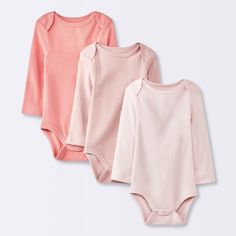 Add soft colors to your little one's closet with the 3-Pack Long-Sleeve Bodysuits from cloud island™. This pack of three pink bodysuits come in varying shades with a wide ribbed design for fun pairing with a variety of bottoms in their wardrobe. The lap shoulders and crotch snaps allow quick dressing and changing. Tailored with 100% cotton, these midweight bodysuits offer soft and breathable comfort all through their day. cloud island™: Designed with love. Made without compromise. Pink Long Sleeve Bodysuit For Loungewear, Casual Long Sleeve Pink Bodysuit, Pink Cotton Bodysuit For Loungewear, Gender Neutral Clothes, Pink Newborn, Winter Baby Clothes, Cloud Island, One Piece Clothing