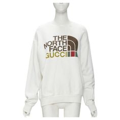 GUCCI THE NORTH FACE logo print white cotton oversized sweatshirt pullover XS Reference: TGAS/C01208 Brand: Gucci Collection: The North Face Material: Cotton Color: White Pattern: Solid Made in: Italy CONDITION: Condition: Excellent, this item was pre-owned and is in excellent condition. SIZING Designer size: XS Size reference: US0 / UK6 / IT38 / FR34 / XXS-XS Size note: This item has an oversized fit. MEASUREMENTS: Shoulder to shoulder: 57cm / 22.2" Chest: 62cm / 24.2" Waist: 61cm / 23.8" Hip: Gucci Collection, Pull Oversize, Gucci Outfits, Longline Coat, Face Logo, Leather Shops, Cashmere Coat, Oversized Sweatshirt, Pullover Sweatshirts