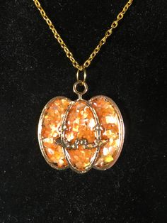 This beautiful sparkly pumpkin is the perfect addition to any fall wardrobe! The crushed mother of pearl shell that fills this jack-o'-lantern necklace adds shine and dimension and wow!  Please include a note with your order as to which color pumpkin you would like.  Combined shipping available Pumpkin Necklace, Halloween Pendant, Whale Necklace, Snowflake Necklace, Custom Candy, Fabulous Christmas, Personalized Pendant, Christmas Charms, Sea Glass Necklace