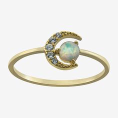 Adding this Silver Treasures 14K gold over silver opal moon ring to your jewelry collection, you are adding sophistication. This ring is crafted in 14K gold over silver and features a simulated opal stone along with Cubic Zirconia stones. With the delicate and sparkling design, this ring can be worn with any wardrobe choices. This ring can be worn alone or with other favorites from your jewelry collection. Wipe ring clean with a soft cloth.Ring Style: Delicate Rings, Stackable Rings, BandsFeatur Fine Jewelry Gold Opal Birthstone Ring, Gold Opal Ring Fine Jewelry, Gold Opal Birthstone Ring, Gold Opal Ring With Birthstone, Celestial 14k Gold Opal Gemstone Ring, Gold Celestial Moonstone Ring In 14k, Adjustable Gold Opal Ring, Gold Adjustable Opal Ring, Round Shape, Gold Opal Ring Adjustable