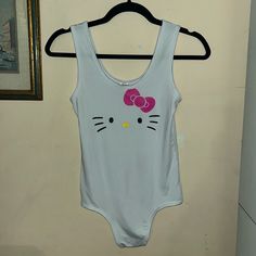 Hello Kitty Bodysuit. New Without Tags. Cute Stretch Summer Onesie, Cute Stretch Onesie For Summer, Cute Fitted Sleeveless Bodysuit, Fun Fitted Cotton Bodysuit, Playful White Stretch Bodysuit, Spring Fun Fitted Bodysuit, Playful Stretch White Bodysuit, Fitted Fun Bodysuit For Spring, Fun Fitted Spring Bodysuit