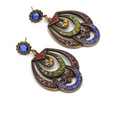 "Horseshoe luck Art Deco earrings. Earrings have a beautiful Art Deco design to them and are several horse shoes attached to each other. These earrings have a mix of red, olive, cobalt, purple and topaz Swarovski crystals set in each earring. The color combination is really beautiful the cobalt crystals really stand out on the antique gold settings. Earrings are very comfortable to wear and will bring you much luck!! Made with swarovski crystal post studs for comfortability and safety. Measures Vintage Jeweled Multicolor Earrings, Vintage Multicolor Jeweled Earrings, Multicolor Jeweled Metal Earrings, Multicolor Jeweled Drop Earrings, Multicolor Jeweled Chandelier Earrings As Gift, Multicolor Metal Costume Jewelry Earrings, Multicolor Jeweled Costume Jewelry Earrings, Multicolor Jeweled Dangle Earrings, Multicolor Pierced Chandelier Earrings As Gift