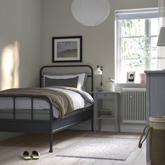 STJÄRNÖ bed frame, anthracite/Lyngör dark gray, Twin. STJÄRNÖ is a classic bed frame with decorative details that add a twist to the steel design – and LYNGÖR mattress base gives extra height and helps your mattress keep its shape for longer. Steel. Bed Base Frame, Mattress Base, High Headboard, Upholstered Headboards, Twin Beds, Classic Bed, Ikea Family, Beds & Bed Frames, Bed Slats