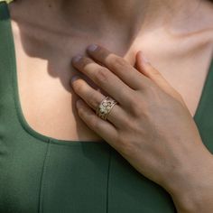 a close up of a person wearing a ring