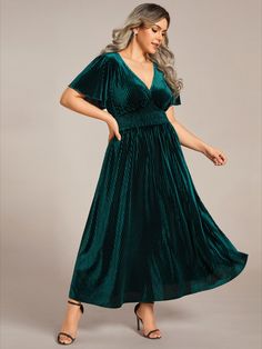 Make a glamorous impression at fall weddings with our Plus Size A-line V-Neck Short Sleeve Pleated Velvet Dress. The V-neckline and A-line silhouette create a flattering and feminine look, while the pleated velvet fabric lends a touch of sophistication. Perfect for formal events, this dress is ideal for wedding guests who want to make a statement. Step into the spotlight and exude confidence and grace in this stunning velvet dress. Green Wedding Guest Dresses, Midi Wedding Guest Dress, Stunning Wedding Guest Dresses, Summer Evening Dress, Purple Evening Dress, Winter Wedding Guest Dress, Formal Wedding Guest Dress, Velvet Evening Dress, Green Evening Dress