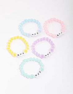 Let your little one express themselves with this pack of stacking bracelets. This bracelet pack includes five individual bracelets, designed with BFF charms in the centre. Style your favourite colours with your besties! Beads Dimensions: Length Adjustable Weight: 31.2g | Lovisa Kids Rainbow BFF Beaded Stretch Bracelet 5-Pack, Blue Rainbow Letter Beads Friendship Bracelets For Beach, Rainbow Plastic Beaded Bracelets For Friendship, Cheap Kawaii Friendship Bracelets, Friendship Rainbow Beaded Plastic Bracelets, Lovisa Bracelet, Phonics Reading Passages, Bracelet Pack, Adjustable Weights, Word Bracelet