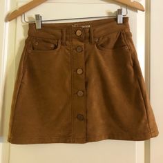 Never Worn! Super Soft Button Down Light Brown/Camel Skirt From Nobo Casual Brown Skirt With Buttons, Brown Button Closure Mini Skirt For Fall, Brown Mini Skirt With Button Closure For Fall, Casual Brown Mini Skirt With Buttons, Brown Buttoned Casual Mini Skirt, Fall Brown Mini Skirt With Button Closure, Casual Brown Buttoned Mini Skirt, Spring Button-up Brown Skirt, Brown Fitted Button-up Bottoms