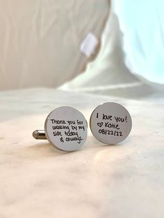 "These high quality cuff links make the perfect, meaningful gift to give your step dad for your wedding. They make a great keepsake to remember your wedding day. The cufflinks come ready to gift in a small box. Each cuff link is crafted from high quality stainless steel. The round cuff links measure 18mm across. The cuff links are carefully engraved by our team here in Southern Indiana. The cuff links feature a polished/shiny finish. They are engraved with \"Thank you for walking by my side toda Gifts For Father Of The Groom From Bride, Father Of The Bride Cufflinks, Wedding Jewelry Gift For Father's Day, Customizable Cufflinks For Father's Day Gift, Customizable Cufflinks As A Father's Day Gift, Father's Day Wedding Gift Cufflinks With Engraving Option, Engraved Cufflinks For Wedding Gift On Father's Day, Engravable Cufflinks For Wedding Gift On Father's Day, Engraved Cufflinks For Father's Day Gift