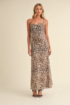 This Feline Fancy Dress showcases a bold leopard print and a stylish cowl neckline. Made with mesh material, it stands out in any crowd. With its maxi length, it is the perfect statement piece for a fancy night out. 95% polyester, 5% spandex Return Policy WE ONLY OFFER STORE CREDIT FOR RETURNS! Feel free to email us at info@shopluxxeapparel.com or DM us with any questions regarding fit, styling, or our return policy in general. To read more into our return policy please click here. Fitted Cowl Neck Maxi Dress For Date Night, Chic Leopard Print Party Maxi Dress, Fall Party Maxi Dress In Leopard Print, Spring Leopard Print Maxi Dress For Night Out, Leopard Print Maxi Dress For Fall Party, Fitted Leopard Print Maxi Dress For Date Night, Leopard Print Fitted Maxi Dress For Date Night, Fall Chic Leopard Print Maxi Dress, Chic Leopard Print Maxi Dress For Fall