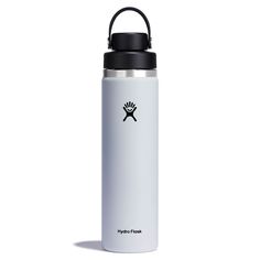 the hydro flask water bottle is white and has a black lid with a logo on it