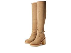 Free People Jasper Tall Boot - Women's Shoes : Camel : Make a stylish statement wherever you go wearing the trendy Free People Jasper Tall Boot. Leather upper. Leather lining and insole. Ankle-zip closure. Strap and buckle detailing around ankle. Knee-high boots. Block heel. Almond toe. Synthetic outsole. Made in Spain. Measurements: Heel Height: 3 1 2 in Weight: 1 lb 13 oz Circumference: 15 in Shaft: 20 in Platform Height: 1 in Product measurements were taken using size EU 39 (US Women's 9), wi Camel Knee High Boots, Clothes Board, Corral Boots, Tall Boot, Tall Boots, Winter Boots, High Boots, Knee High Boots, Wedge Boot