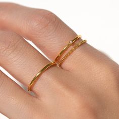 Say hello to our Triple Threat Ring Set! This set of three rings is all about mixing, matching, and stacking to create your own unique style story. With a splash of sparkle and a whole lot of fun, these rings are here to make you the life of the party. Minimalist Stacked Midi Rings As Gift, Stacked Midi Rings As A Gift, Dainty Stacked Rings As A Gift, Stackable Double Band Rings For Gift, Stackable Double Band Rings As Gift, Trendy Stackable Rings For Anniversary, Stackable Double Band Rings For Gifts, Fine Jewelry Midi Rings With Double Band As Gift, Fine Jewelry Double Band Midi Rings As Gift