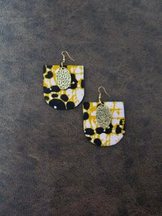 Ankara print fabric and wooden earrings.  French hooks.  light weight Ankara Earrings, Afrocentric Earrings, Rustic Earrings, Earrings Wood, Ankara Print, Fabric Earrings, Sea Glass Earrings, Bold Earrings, Porcelain Jewelry