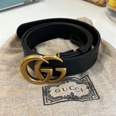 Style 414516 Ap00t 1000 A Slim Leather Belt With Our Signature Double G Buckle. Made In Smooth Leather. Black Leather Brass Hardware Double G Buckle Buckle: 2.4"W X 2"H 1" Belt Width Made In Italy Can Be Worn As A Hip Or Waist Belt. Sizing Will Differ Based On Where The Belt Is Worn, Please Refer To The Size Guide To Find Your Size. Size: Gucci 75 , Us:25, 2 Never Worn Gucci Belt Women, Gucci Leather Belt, Fun Questions, Luxury Belts, Branded Belts, Gucci Leather, Gucci Belt, Gucci Accessories, Colonial House