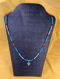 Single Strand necklace in Native Turquoise colors.  22" long. Adjustable Beaded Turquoise Pendant Necklace, Southwestern Beaded Turquoise Pendant Necklace, Turquoise Pendant Beaded Necklace With Adjustable Fit, Southwestern Style Beaded Turquoise Pendant Necklace, Southwestern Turquoise Necklace With Tiny Beads, Southwestern Turquoise Pendant Beaded Necklace, Multicolor Beaded Southwestern Turquoise Necklace, Southwestern Blue Necklace With Tiny Beads, Spiritual Turquoise Beaded Chain Necklace