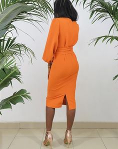 This Faux Wrap Midi Pencil Dress with Big Bishop Sleeve is perfect for any special occasion. Crafted from a luxurious blend of crepe this dress is comfortable to wear and hugs your body in all the right places. The orange hue adds a pop of color to any outfit while the midi cut and sleeved sleeves create a timeless silhouette. Perfect for weddings and parties. Product Features Please Compare your Measurements To our Size Chart Before Purchase Dress Comes With Same Fabric Waist Tie Belt Faux Wrap Big Sleeve Dress, Big Sleeves Dress, Orange Wrap Dress, Big Sleeves, Midi Pencil Dress, Printed Carpet, African Mud Cloth, Dress Orange, Bishop Sleeve