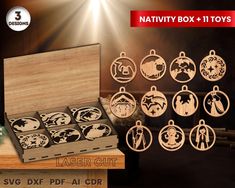 wooden laser cut christmas ornament set in box with nativity box and it's contents