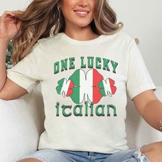 Our Lucky Italian St. Patrick's Day Shirt is a fusion of Italy pride and St. Patrick's Day charm perfect for the parade or the pub! Celebrate the Irish holiday with some Italian pride with this tee year after year. Great for the whole family or Italian couples who are getting their shamrock on! Sláinte and Buon San Patrizio️ Find more fun & trendy designs at https://bellawarriorboutique.etsy.com 💌Enjoy FREE SHIPPING IN THE U.S. ON ORDERS OF $35 OR MORE - *Shipping charges will be added at checkout for any order outside the U.S.* Thank you for supporting our small, veteran owned business This classic Bella & Canvas 3001 unisex jersey short sleeve tee fits like a well-loved favorite. Soft cotton and quality print make users fall in love with it over and over again. These t-shirts have-ribbe St. Patrick's Day Graphic Print Crew Neck Top, St. Patrick's Day Cotton Crew Neck Tops, Cotton Crew Neck Top For St. Patrick's Day, Cotton Top With Letter Print For St. Patrick's Day, San Patrizio, Italian Pride, Italian Travel, Italian Humor, Italy Flag