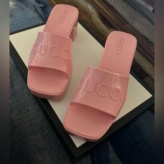 Brand New Women's Rubber Slide Sandal Pink Color - 100% Authentic Details - Size 34 I Think It Could Fit A Size 5 - Brand New Never Used - Good Condition - Comes With A Dust Bag And A Box - Authentic Cards - Color Pastel Pink Rubber Description A Playful Twist On An Essential Style, The Slide Sandal Is Presented In A Delicate Shade Of Pink Rubber For The Pre-Fall 2020 Collection. Recalling '90s Style, A Chunky Heel And Embossed Logo Add A Retro Appeal. Pastel Pink Rubber Women's Embossed Gucci L Chic Gucci Flat Sandals, Designer Patent Leather Slip-on Heels, Gucci Flat Sandals For Formal Occasions, Gucci Formal Flat Sandals, Luxury Summer Slip-on Heels, Gucci Block Heel Summer Heels, Designer Patent Leather Flat Sandals, Summer Gucci Block Heels, Gucci Block Heels For Summer