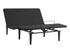 an adjustable bed frame with black fabric