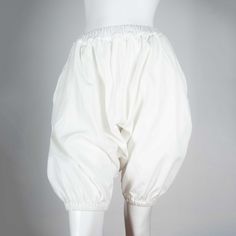 "Comme des Garçons 2010 white harem pants with elastic waist and hem. Ballooning fabric gives these pants comfort and a singular silhouette.  YEAR: 2010 MARKED SIZE: XS US WOMEN'S: XXS FIT: Regular WAIST: 11\" INSEAM: 5\" HIPS: 20\" LENGTH: 22\" MATERIAL: Cotton CONDITION: Excellent COLOR: White" White Harem Pants With Elastic Waistband For Spring, Baggy White Harem Pants With Elastic Waistband, Spring White Loose Fit Harem Pants, Spring White Loosely Fitted Harem Pants, White Bloomers With Elastic Waistband For Spring, Spring White Bloomers With Elastic Waistband, White Baggy Harem Pants, White Baggy Harem Bottoms, White Loose Fit Ankle-length Harem Pants