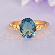 Blue Green Teal Sapphire and Citrine Engagement Ring Oval Shaped Blue Sapphire Vintage Teal Sapphire Ring Valentina's Day Gift For Wife Welcome to A1Jewells Experience stunning jewelry which compliments your style everyday, All the items in my shop are hand made items and are crafted by our Master Goldsmith in our workshop, We pay a lot of emphasis on the making of the ring and we always assure you that we will provide best quality products every time toy you, Detailed description of the product *Main Stone: Sapphire  *Main Stone Creation: Lab created *Main Stone Size: 6x8mm *Main Stone Color: Green ,Blue *Main Stone Shape: Oval *Birthstone Month: September *Secondary Stone: American diamond *Secondary Stone Color: White *Secondary Stone Size: 2mm   Jewelry Type: Engagement Ring Metal: 925 Oval Turquoise Topaz Ring For Wedding, Blue Oval Topaz Wedding Ring, Citrine Engagement Ring, Teal Sapphire Ring, Rings Sapphire, Citrine Ring Engagement, Saphir Ring, Engagement Ring Oval, Teal Sapphire