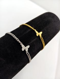 ❤️Introducing our Dainty Women Butterfly Charm Bracelet, a beautifully minimalist piece perfect for gifting. Customized with an initial-engraved tag on a personalized curb chain bracelet, it's designed to symbolize transformation and personal growth. Each bracelet is crafted for comfort fit, making it a joy to wear every day.❤️ ❤️Ideal for any occasion, from anniversaries to birthdays, this fashion bracelet makes a heartfelt gift for your girlfriend, wife, sister, or BFF. Its tarnish resistance ensures long-lasting beauty, blending effortlessly with both hip hop wear and streetwear styles.❤️ 🥰Our shop is committed to excellence, offering you a product that not only meets but exceeds your expectations.  🔆 EXCEPTIONAL CRAFTSMANSHIP: Each of our Jewelry is a masterpiece of detail and design Dainty Hypoallergenic Stainless Steel Bracelets, Dainty Stainless Steel Bracelet With Adjustable Chain, Adjustable Minimalist Stainless Steel Charm Bracelet, Minimalist Adjustable Stainless Steel Charm Bracelet, Minimalist Metal Charm Bracelet, Trendy Delicate Chain Bracelet Gift, Minimalist Metal Charm Bracelet With Adjustable Chain, Minimalist Metal Charm Bracelet With Delicate Chain, Trendy Delicate Chain Bracelet As Gift