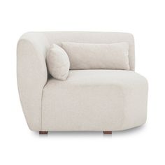 a white chair with two pillows on the armrests and a pillow on the back