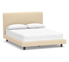 a bed with white sheets and pillows on it's headboard, against a white background