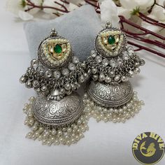 Diva Exclusive Statement Earring in Brass plating with silver coated Metal : Brass with 92.5 Silver Polished Nickel Free Handcrafted Perfect for all occasion(Party, Wedding ,Engagement) Free US standard shipping Ready to ship from New Jersey , United States Highest quality and craftsmanship CARE Store them in moisture free areas and keep them away from water and liquid fragrances Oxidised Jhumka, Jewellery Earrings, Statement Earring, Silver Coat, Fancy Jewelry, Fashion Jewelry Earrings, Engagement Jewelry, Fashion Jewellery, Silver Jewellery