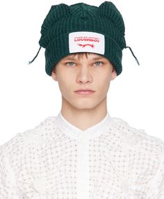 Rib knit RWS-certified lambswool and recycled nylon-blend beanie in green. Exposed seams throughout. · Textile logo patch at rolled brim · Graphic appliqués and loose threads at crown Supplier color: Forest green Lover Boy Beanie, Boy Closet, Charles Jeffrey Loverboy, Charles Jeffrey, Boys Beanie, Boys Closet, Blue Beanie, Daisy Studs, Exposed Seams