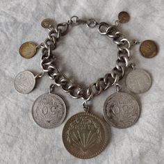 Here Is A Vintage Bracelet Mexico Coins This Was Purchased Years Ago At An Antique Mart Uno Peso 50 Centavo 20centavo 10centavo And Other Coins I Will Update When I Find My Magnifying Glass Thanx For Looking Vintage Charm Bracelet, Vintage Bracelet, Magnifying Glass, Vintage Bracelets, Jewelry Vintage, Study Motivation, Vintage Charms, Womens Jewelry Bracelets, Handmade Silver