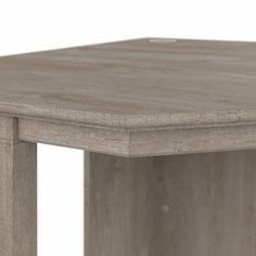 a close up of a wooden table with no one on it's legs or feet