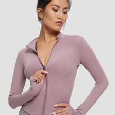 Detached Zip-Up Fitted Long Sleeve Jacket (Mauve/Purple) - Nap Loungewear Designed To Fit Your Body And Mold To Your Curves! This Lightweight Jacket Features A High Collar With Full Front Zip, Thumbholes In Sleeve, And Is Created Using 4-Way Stretch Material. Size Small (But Fits Small, More Like An Xs) Flatlay Measurements: Pit To Pit: 16" Length: 18" Sleeve: 23" (From Shoulder Seam) Note: This Garment Does Stretch New With Tags Please See Actual Product Photos For Color, Which May Vary Slightl Purple High Stretch Long Sleeve Activewear, Long Sleeve Purple Sports Top, Purple Long Sleeve Sports Top, Mauve Long Sleeve Tops For Winter, Fitted Lavender Tops For Fall, Purple Long Sleeve Athleisure Activewear, Purple Long Sleeve Winter Activewear, Lavender Fitted Long Sleeve Top, Fitted Mauve Top For Fall