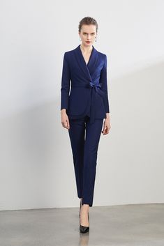 Navy Blue Belted Business Blazer, Pant and Pantsuits SetPeak lapels; front button blazer V-Neck, Long sleeves Structured shoulders. Chest welt pockets. 90% Polyester, 10% Spandex Hip flap pockets Plaid suit Polyester lining Imported Item No.: C1114 Pant Suits, Business Pants, Plaid Suit, Navy Suit, Power Suit, Navy Blazer, Navy Pants, Blazer Buttons, Set For Women