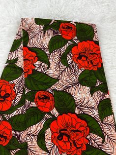 This Green and orange African Fabric is high quality African print made from 100% cotton and it's 45 inches wide. It is used for making African Clothing, African quilts, & For Home decoration. FYI: Print is Double sided. The listing is for 1, 6 yards and Headwrap Each piece of fabric measures:  36in by 45in for 1 yard 216in by 45in for 6 yards 70in by 22in for Head wrap If you purchase more than one yard, you will receive one continuous piece. *If you require more than what I have listed, feel free to send me email. CARE INSTRUCTIONS: *DO NOT BLEACH *Hand wash with cold water and mild soap or Dry clean *Press with hot iron for a crispy look. Color may be different due to your monitor African Fabric Store, Green Ankara, Wedding Fabrics, African Quilts, African Skirts, Clean And Press, African Prints, African Wax Print, African Print Fabric